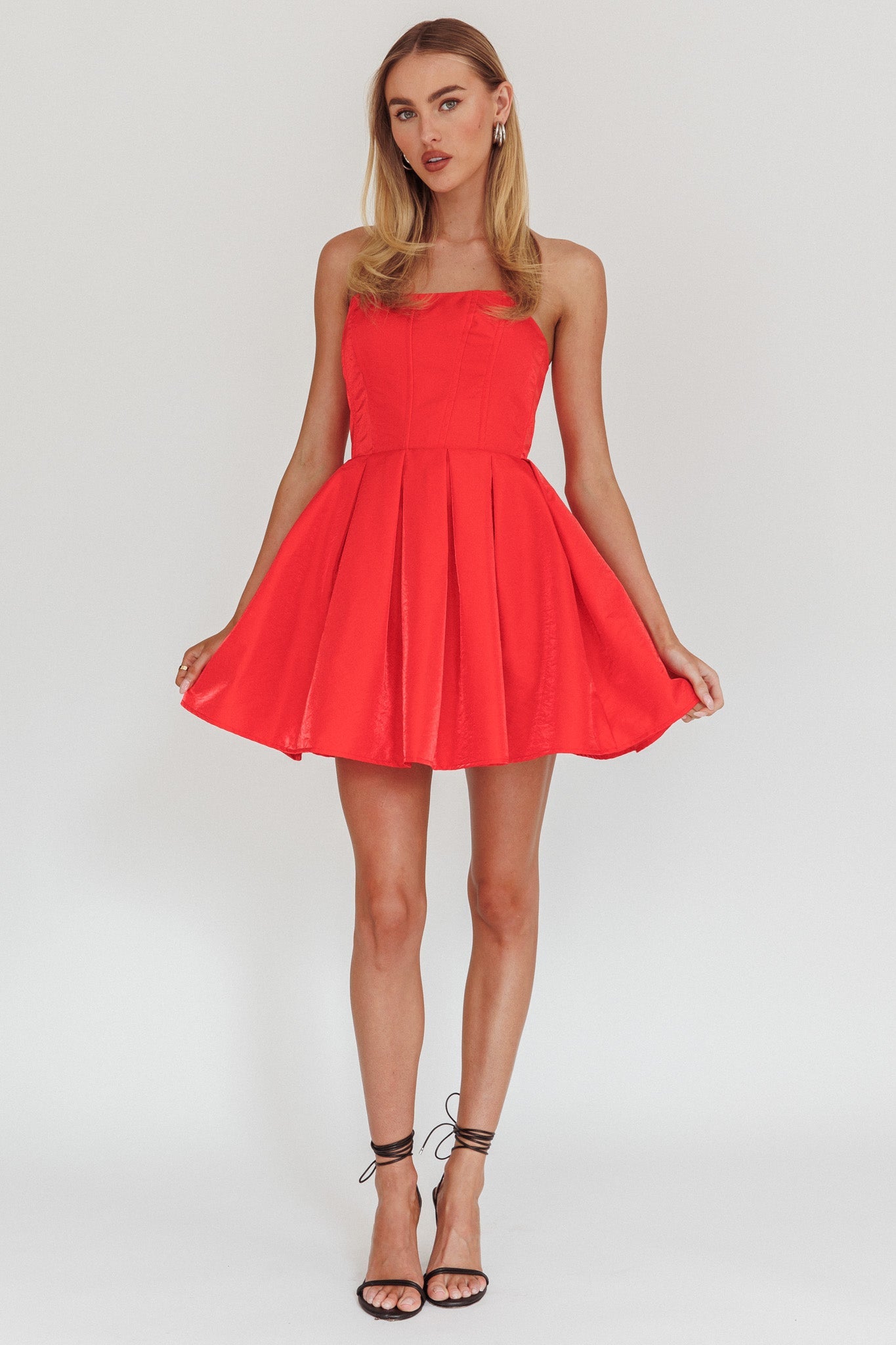 Mini abito svasato senza spalline Loveless rosso