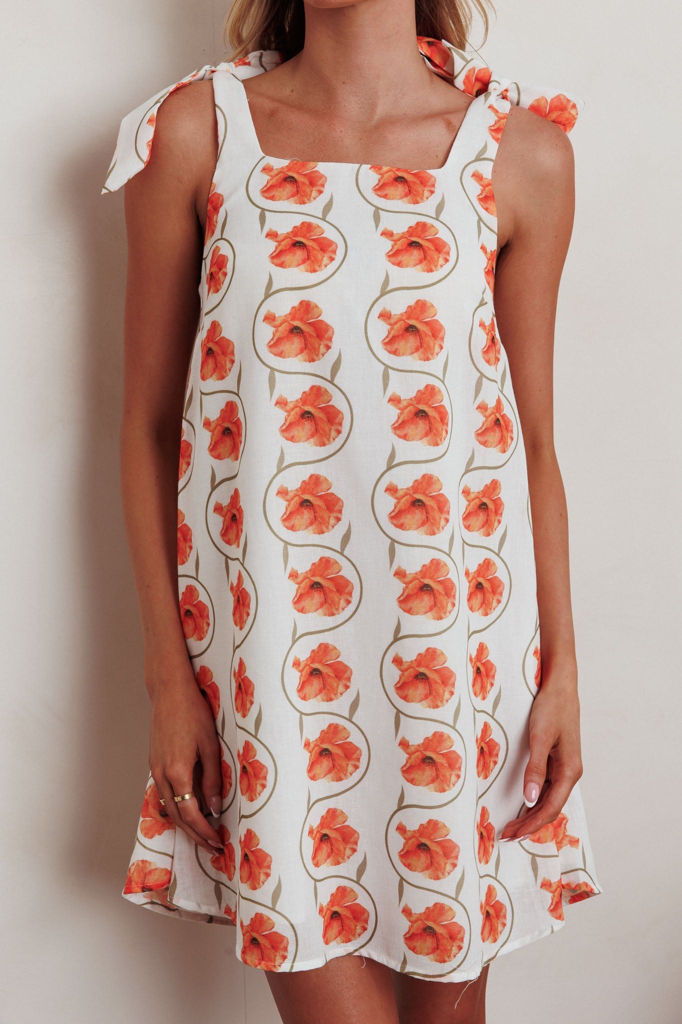 Annalee Mini abito con spalle legate e stampa floreale arancione