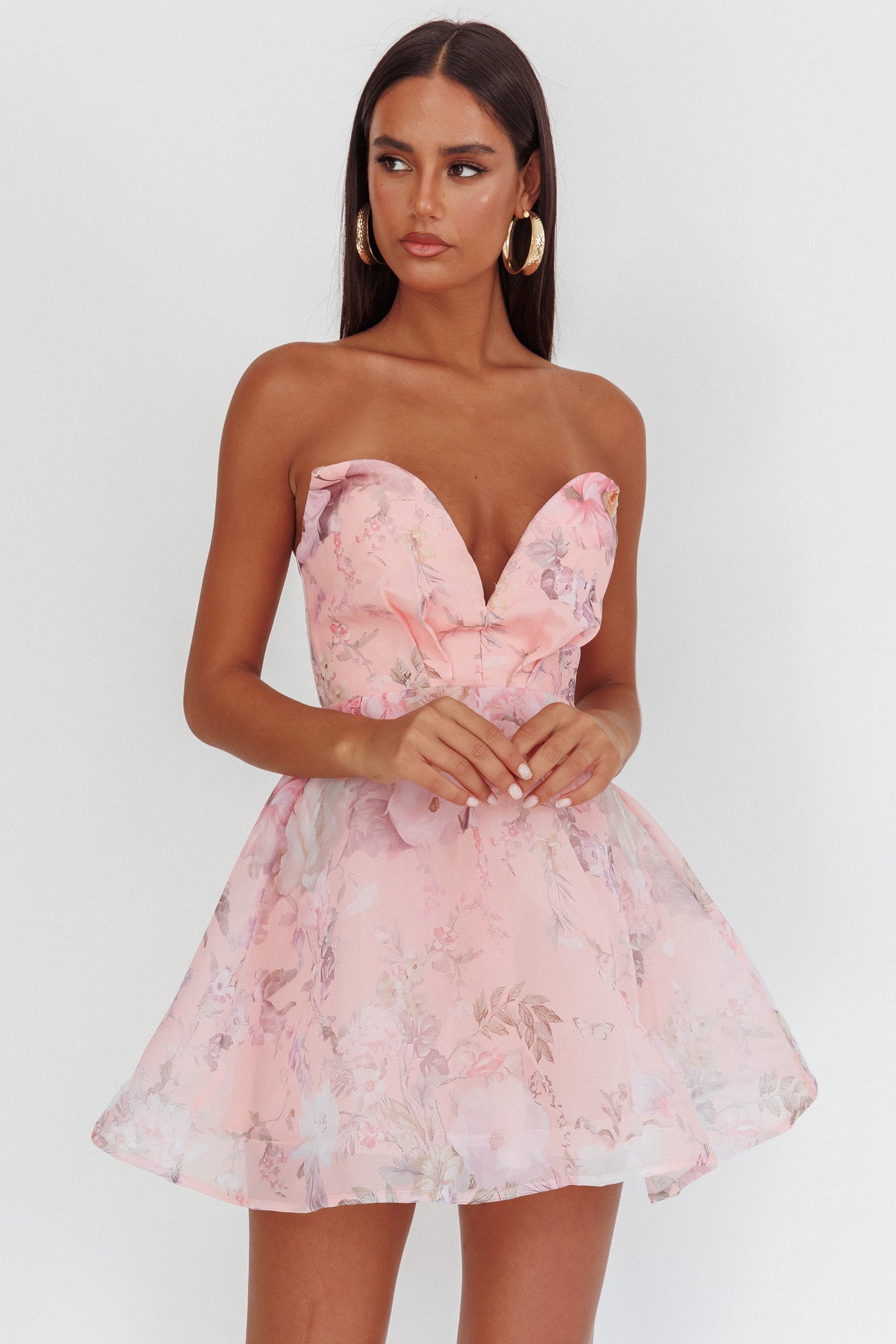 Mini abito con scollo a cuore profondo e motivo floreale rosa