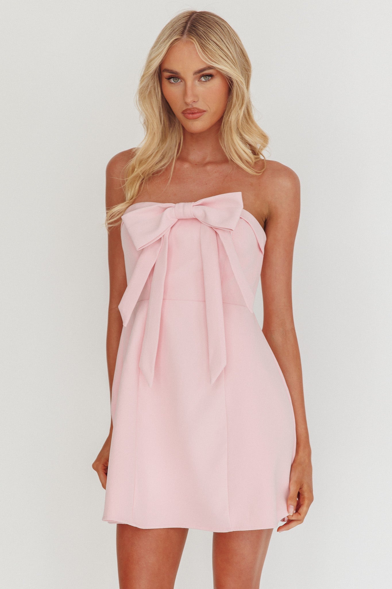 Mini abito con fiocco senza spalline e busto a forma di lecca-lecca, colore rosa sorbetto