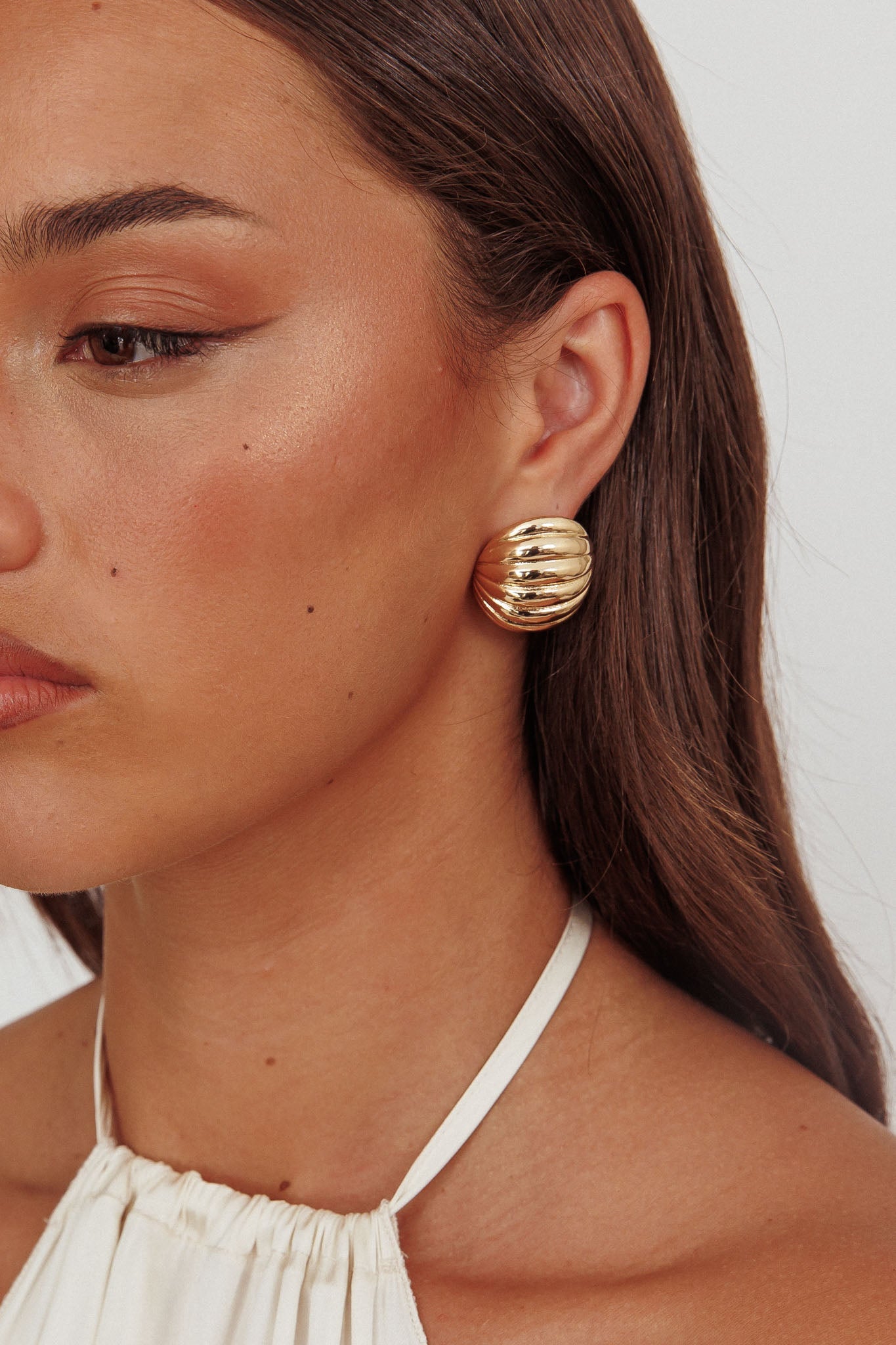 Orecchini Shelly Ribbed Curve in oro