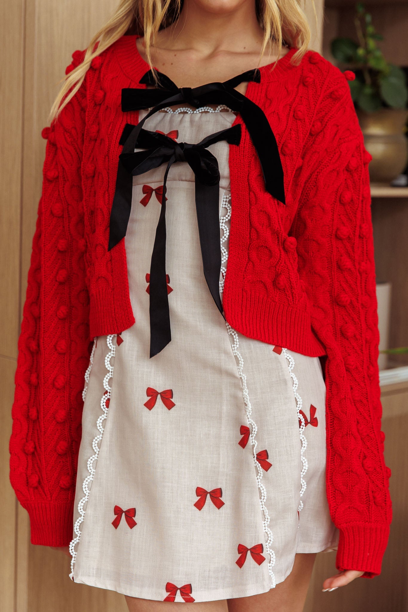 Cardigan con fiocco in velluto Tera rosso