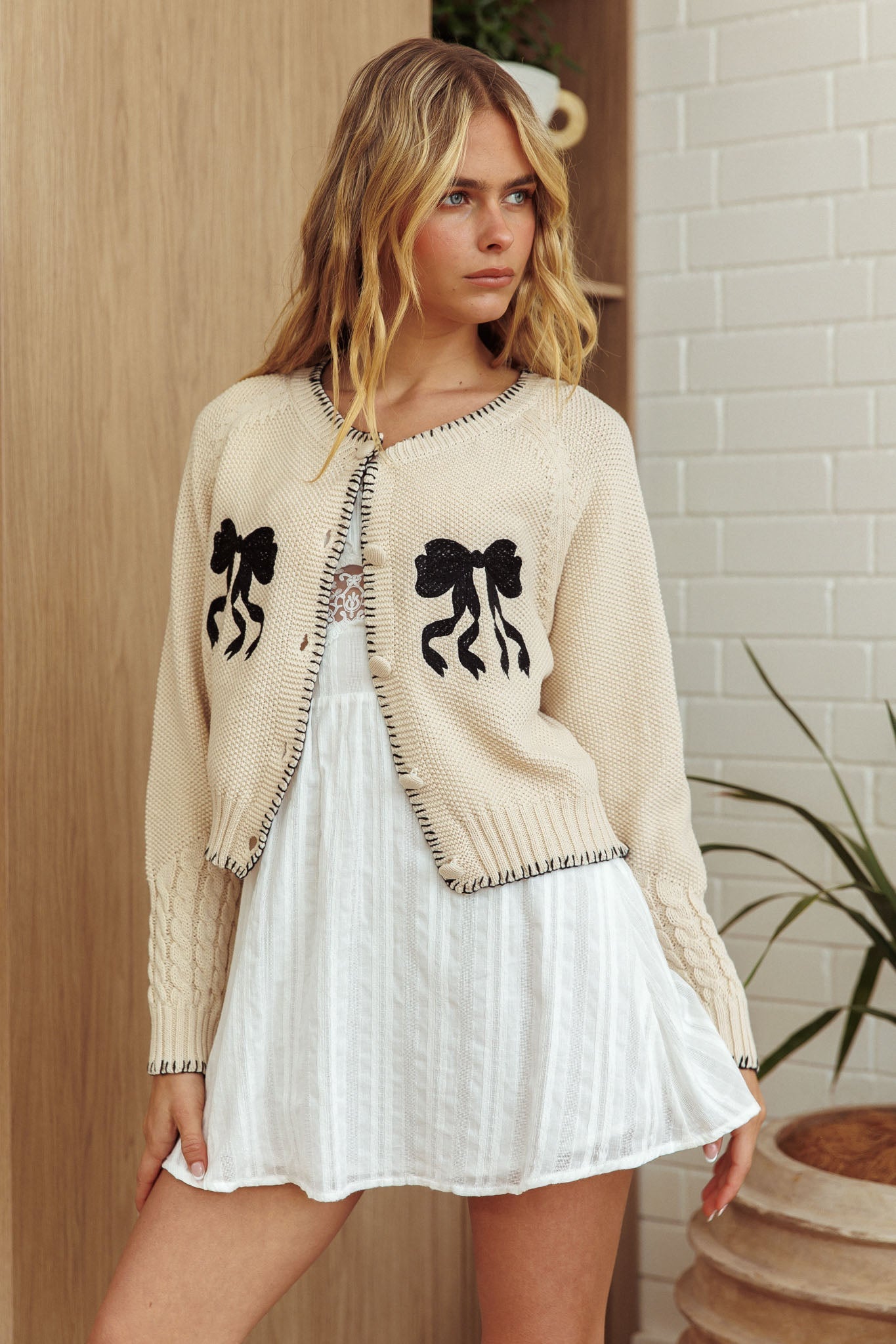 Cardigan con fiocco a punto coperta Early Snow Ecru