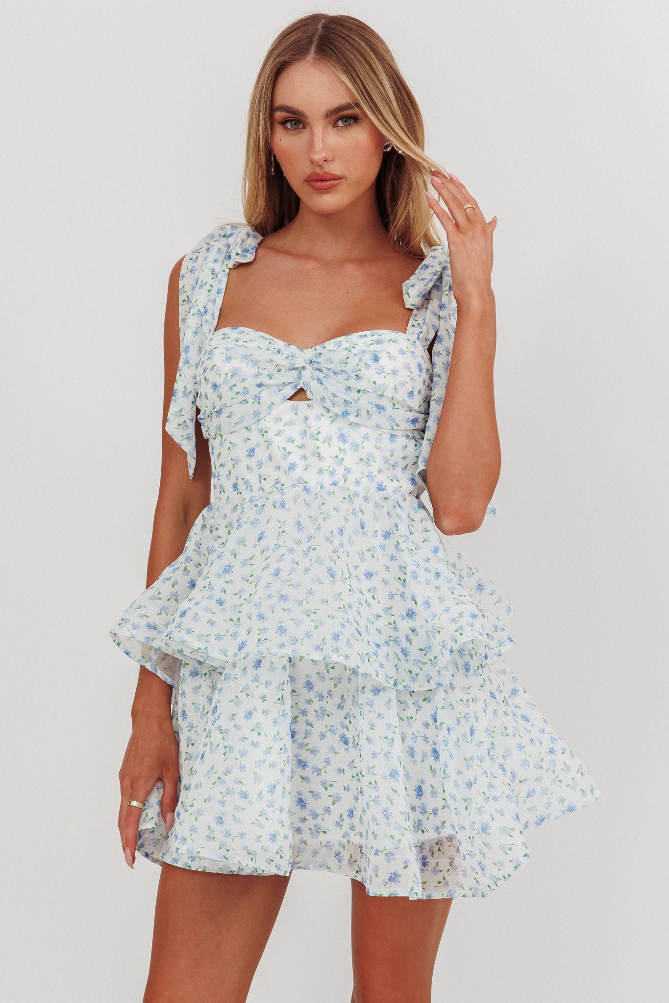 Oliana Mini abito a balze con spalle annodate e stampa floreale blu