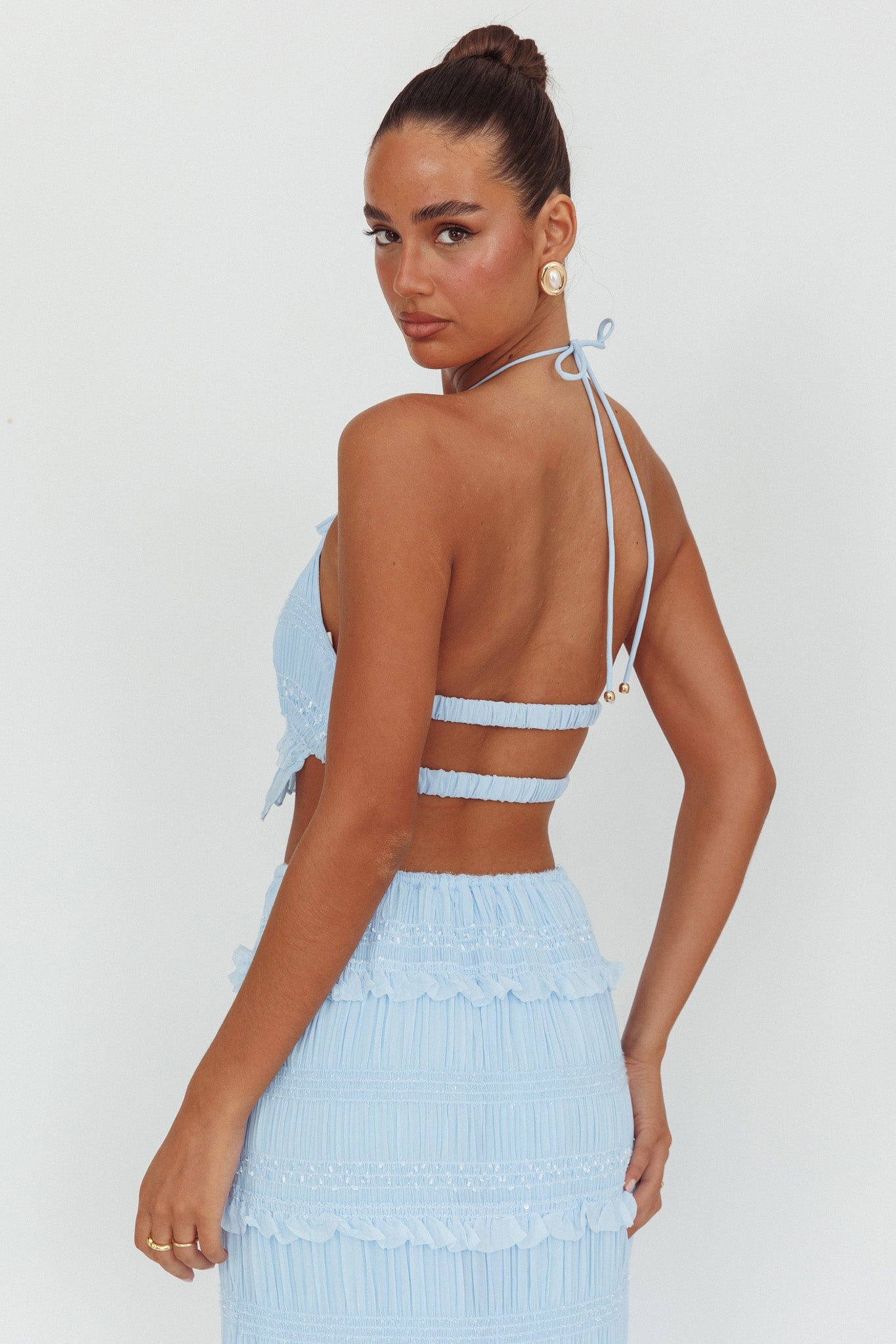 Top con scollo all'americana e paillettes arricciate Helios blu