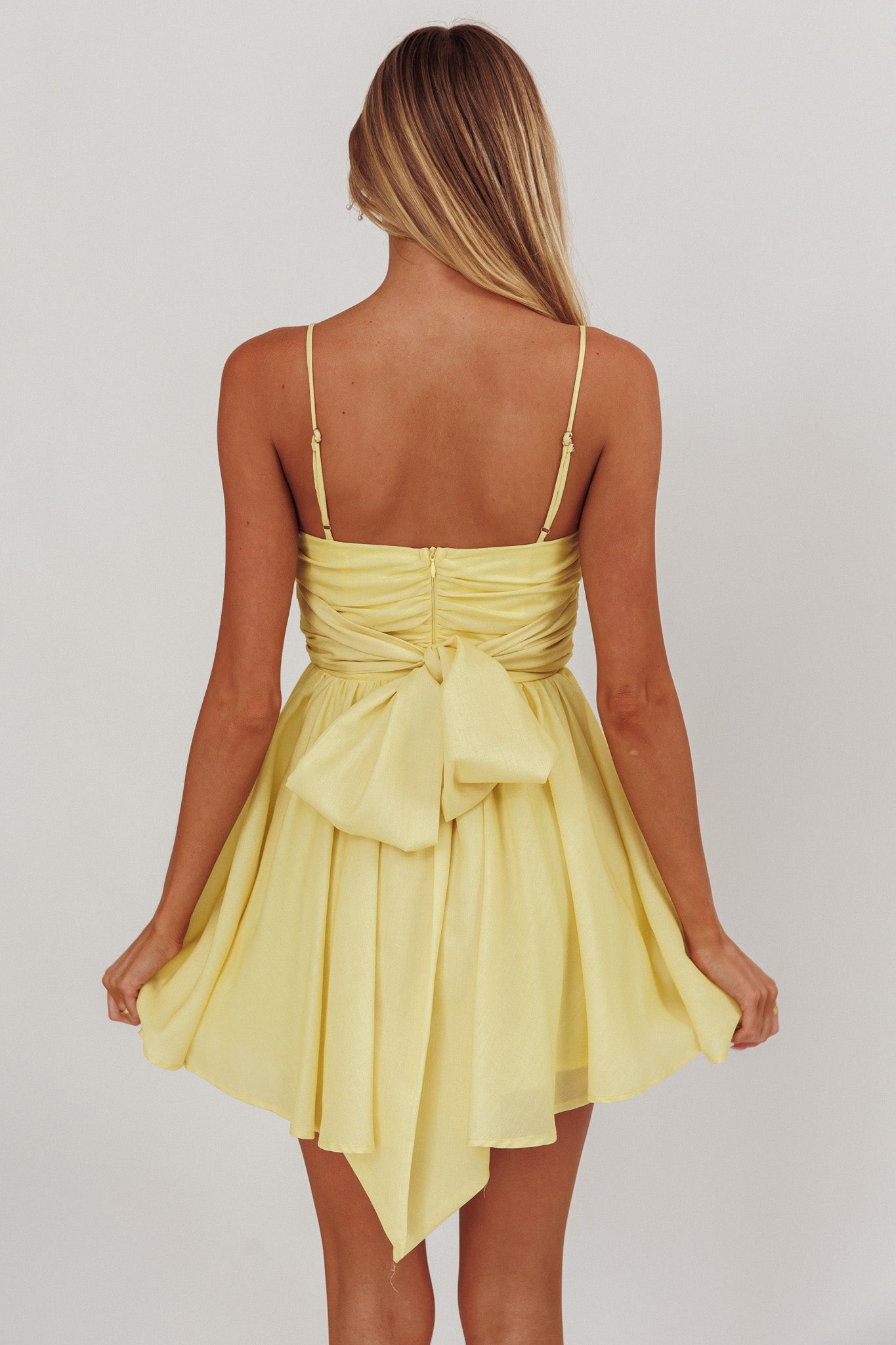 Mini abito svasato con fiocco floreale Festivity giallo