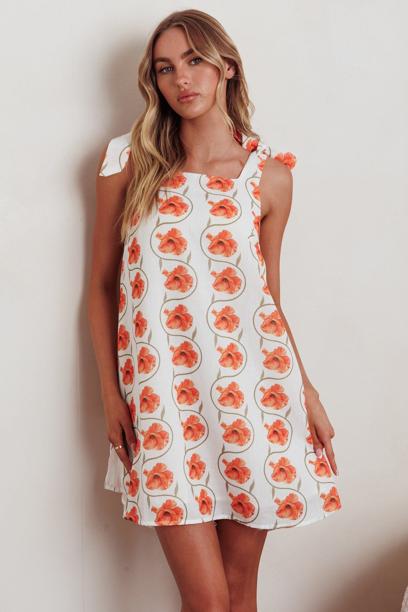 Annalee Mini abito con spalle legate e stampa floreale arancione