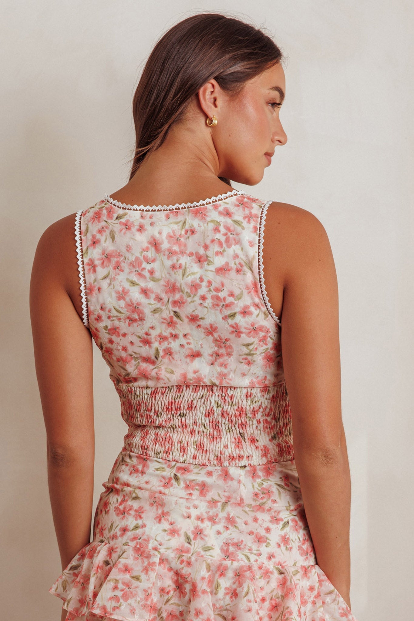 Top corto arricciato Loveletters rosa floreale