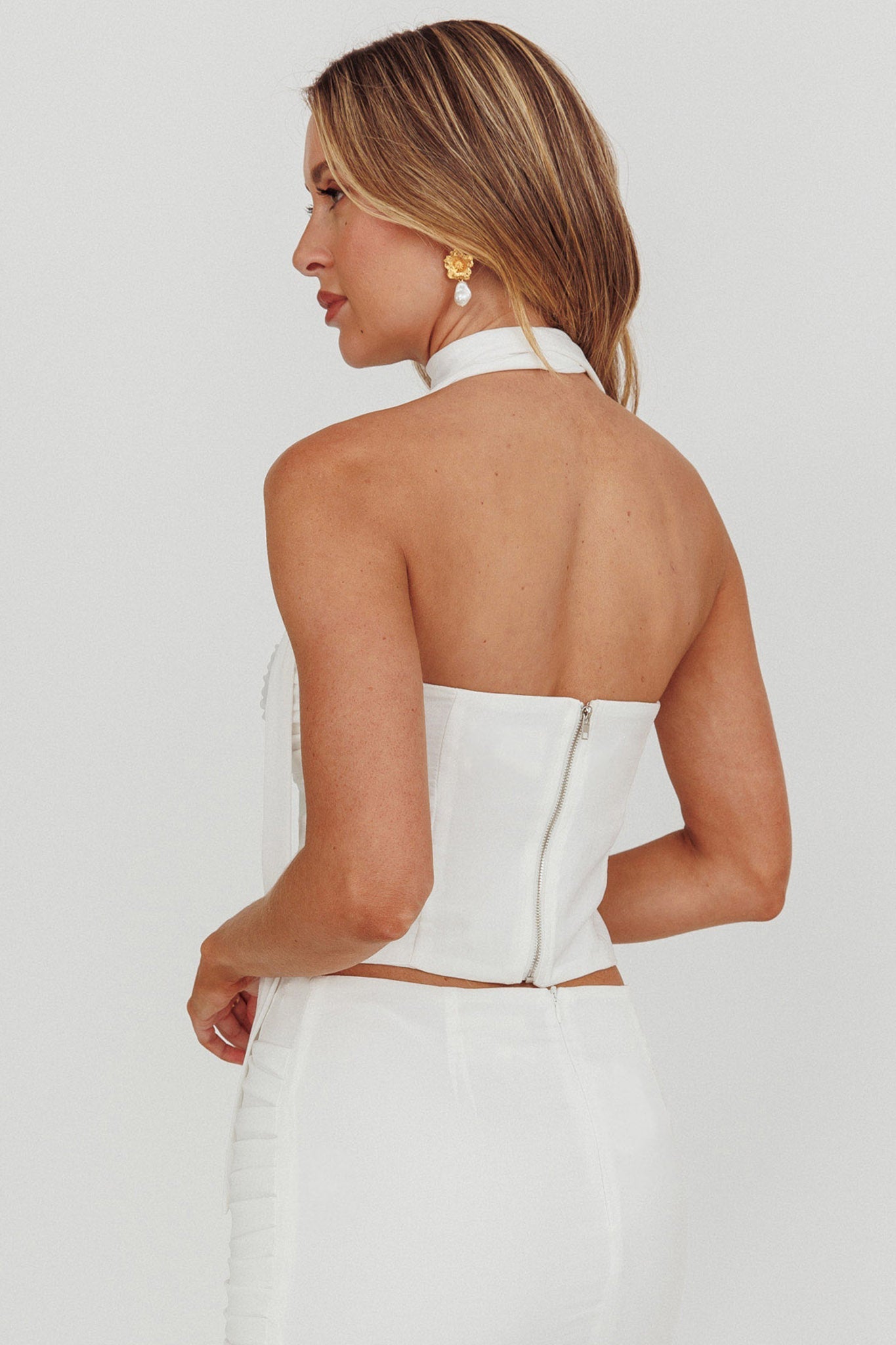 Top senza spalline Charise con laccetti al collo color avorio