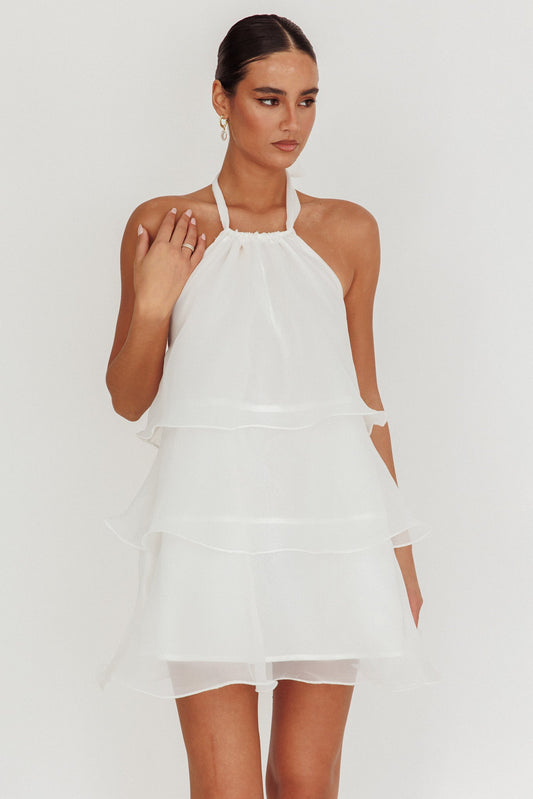 Mini abito bianco con scollo all'americana e balze a tulipano