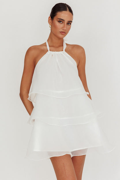 Mini abito bianco con scollo all'americana e balze a tulipano