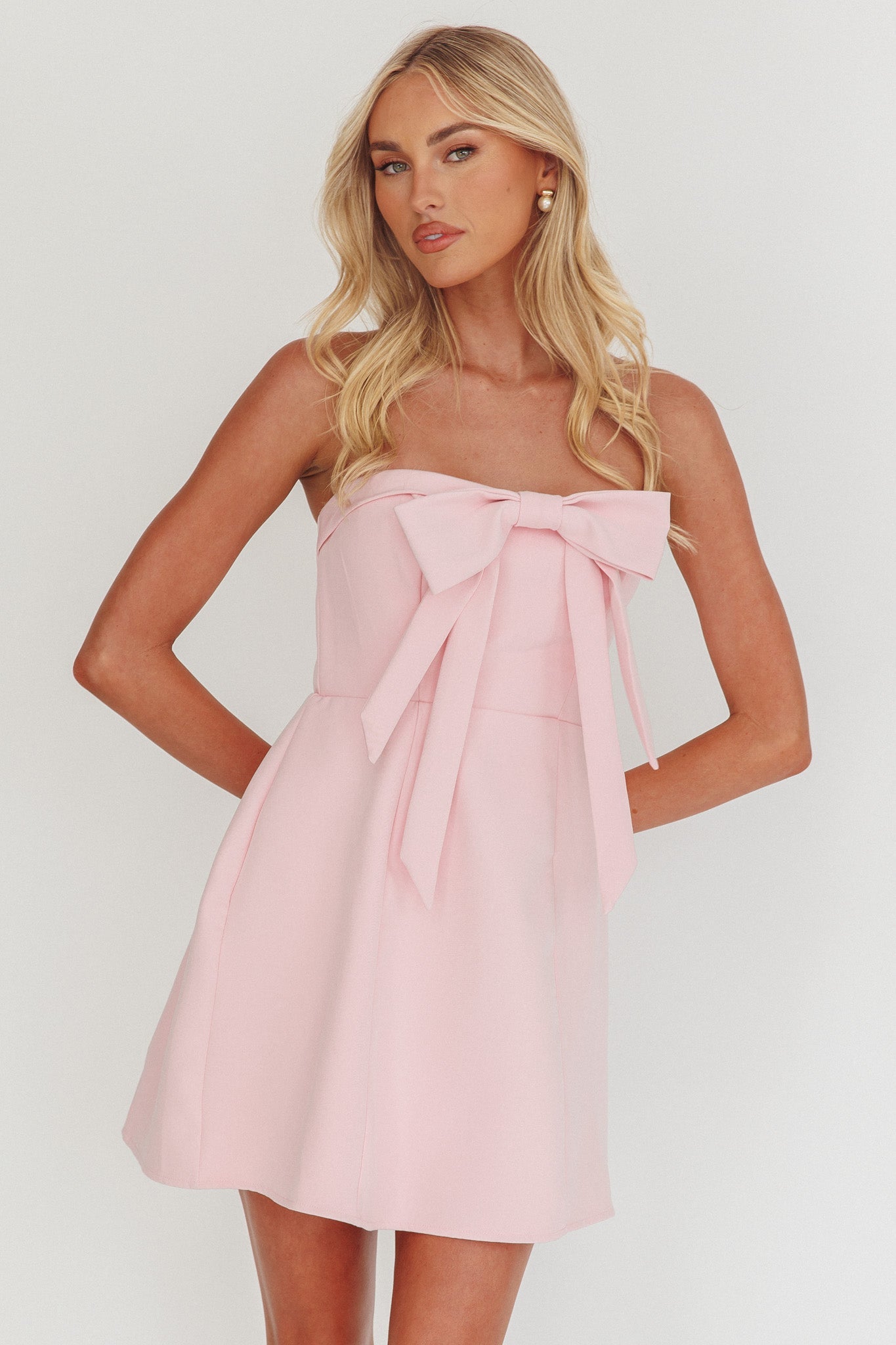 Mini abito con fiocco senza spalline e busto a forma di lecca-lecca, colore rosa sorbetto