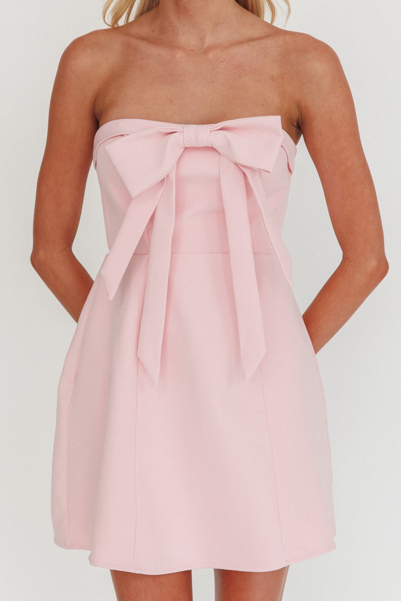 Mini abito con fiocco senza spalline e busto a forma di lecca-lecca, colore rosa sorbetto