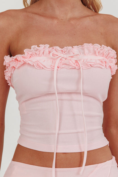 Top senza spalline con volant color zucchero glassato rosa