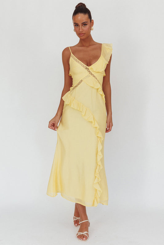 La Estrella Maxi Dress con volant e pizzo color burro