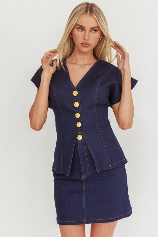 Gonna corta in denim con bottoni dorati