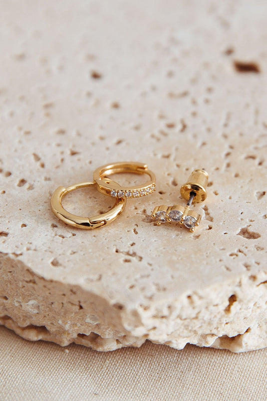 Set di orecchini in cristallo con segni zodiacali in oro