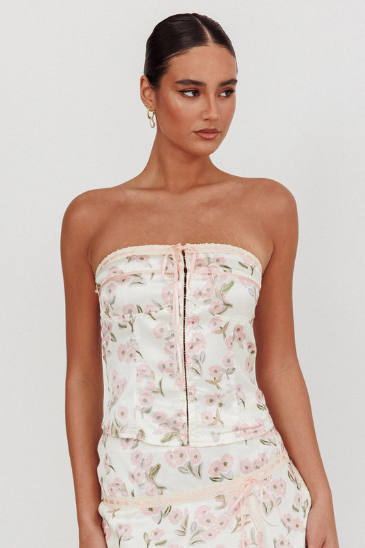 Top senza spalline Tiya con fiocco floreale rosa