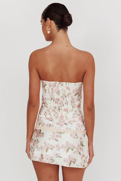 Minigonna Tiya con pizzo floreale rosa
