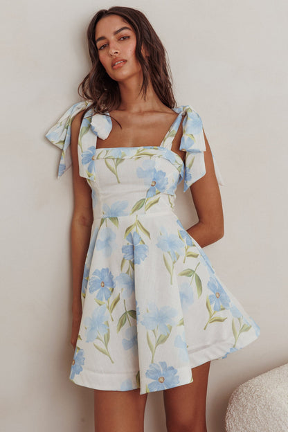 Mini abito Jeanie con spalle annodate e fiori blu