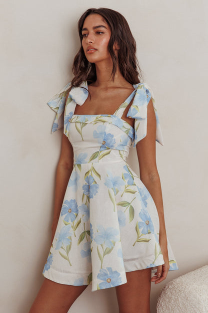 Mini abito Jeanie con spalle annodate e fiori blu