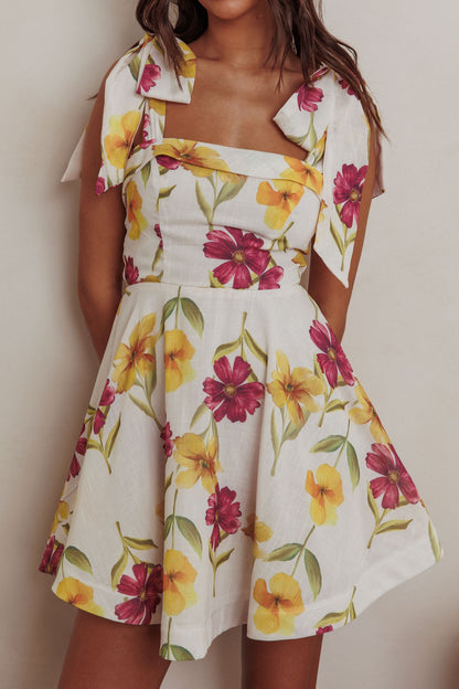 Mini abito con spalle legate Jeanie e fiori viola