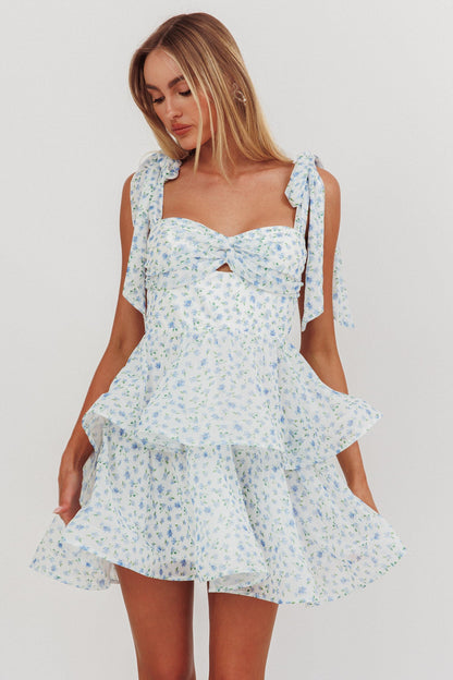 Oliana Mini abito a balze con spalle annodate e stampa floreale blu
