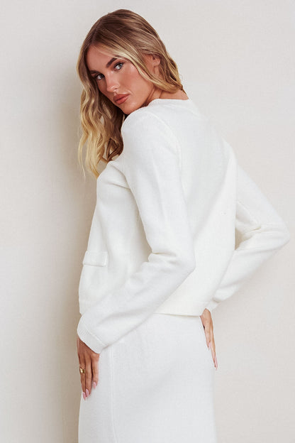Top in maglia con orlo curvo Autumn Breeze bianco sporco