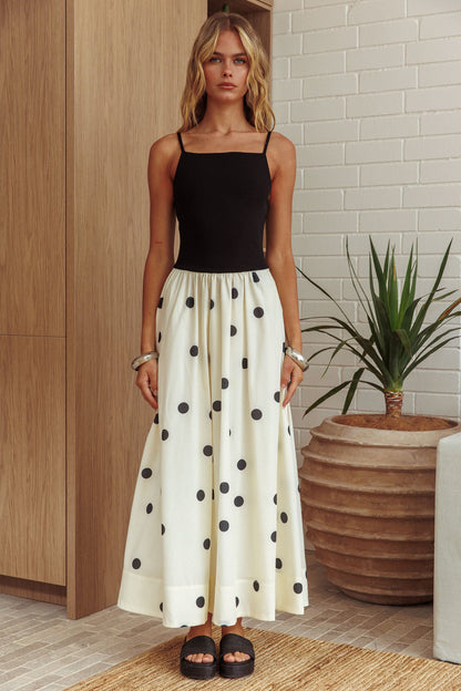 Abito lungo con corpetto a contrasto Melbourne a pois nero