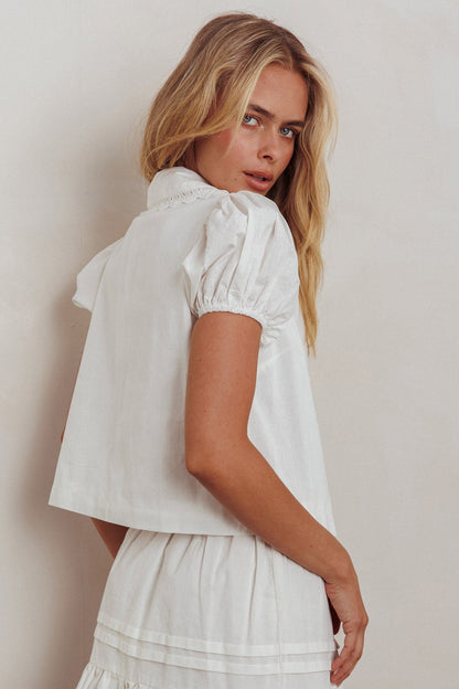 Top bianco con nodo frontale Danessa