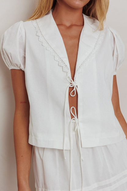 Top bianco con nodo frontale Danessa