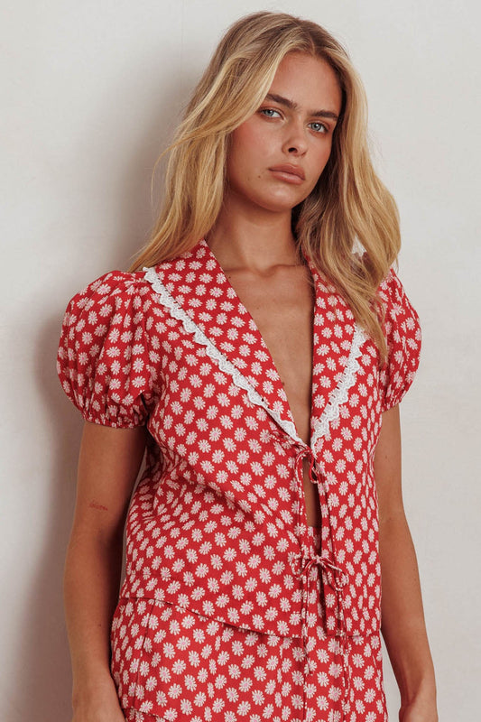 Top Danessa con nodo frontale e motivo floreale rosso