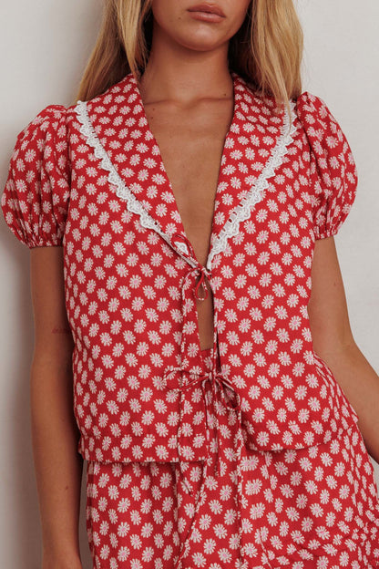 Top Danessa con nodo frontale e motivo floreale rosso