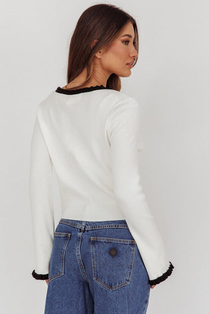 Cardigan con volant Oshan color crema