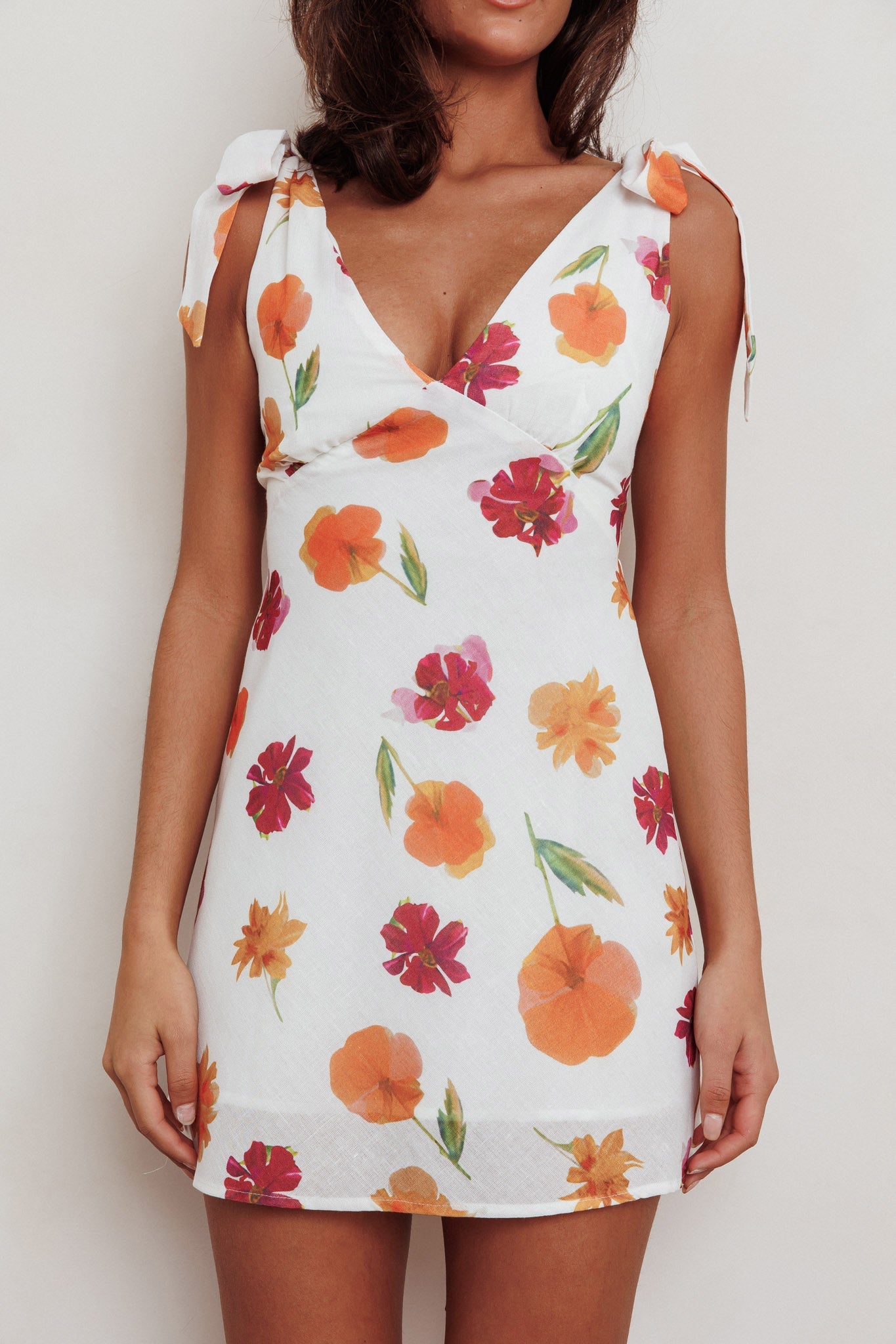 Mykonos Morning Mini abito con spalle legate e fiori arancioni