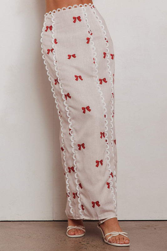 Gonna lunga Chamberlain con bordo smerlato e fiocco rosso