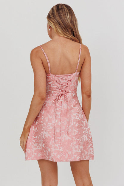 Mini abito Kyrah con lacci sul retro e stampa floreale rosa
