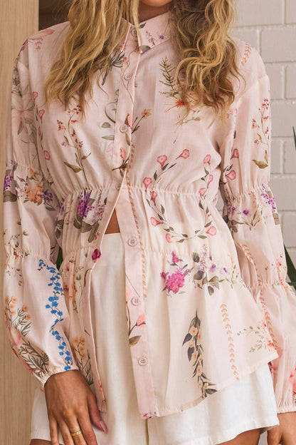 Top a maniche lunghe con bottoni Mirrie floreale color crema