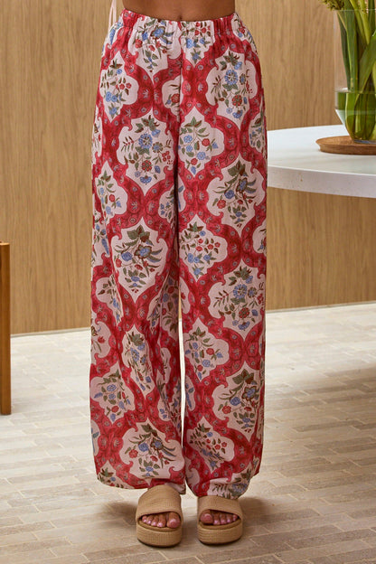 Pantaloni Archa con elastico in vita e stampa color crema