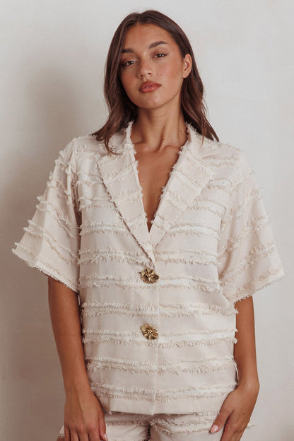 Top con colletto e rifiniture a bordo grezzo Reed, color crema