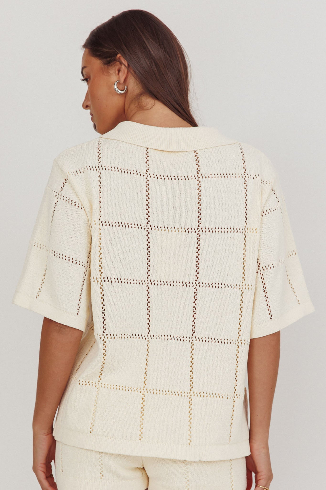 Top con bottoni dorati in maglia da marinaio color crema